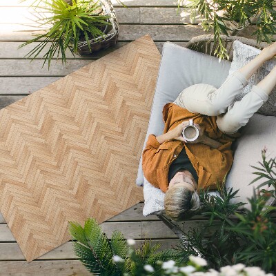 Vinyl carpet Beautiful wooden parquet in heringbone shape