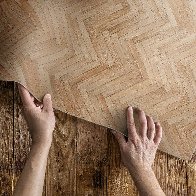 Vinyl carpet Beautiful wooden parquet in heringbone shape