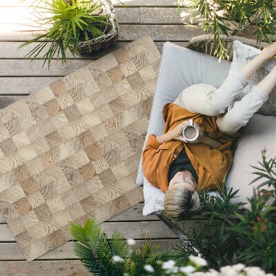 Vinyl carpet Mosaic of wooden squares of tree rings