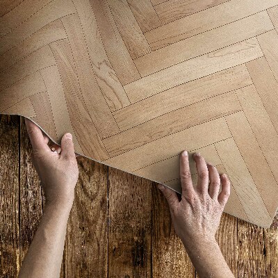 Vinyl carpet Elegant light wood parquet flooring with herringbone