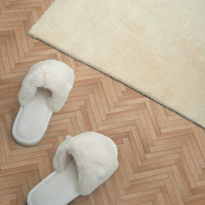Vinyl tiles Herringbone pattern in the arrangement