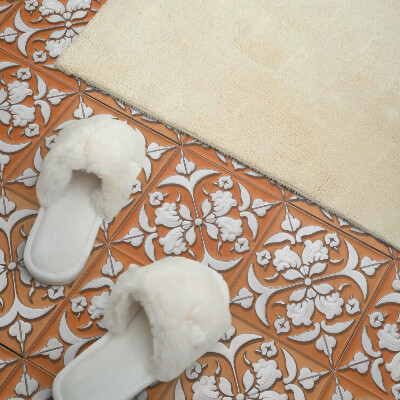 Self adhesive vinyl floor tiles An elegant floral motif