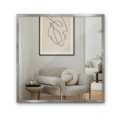 Rectangular wall mirror with a silver frame