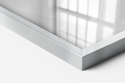 Rectangular wall mirror with a silver frame