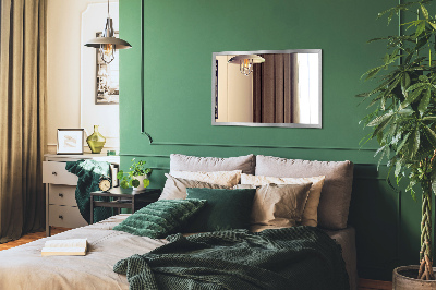 Rectangular wall mirror with a silver frame