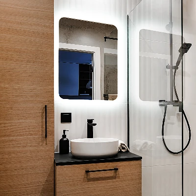 Rectangular mirror with rounded edges and LED lighting