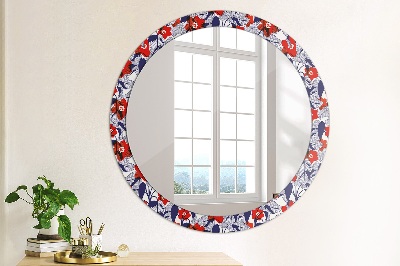 Round mirror decor Philodendron and red flowers