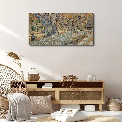 Tree-lined street in the spring sun Canvas wall art