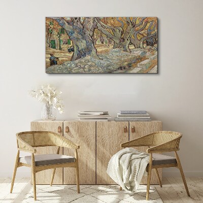 Tree-lined street in the spring sun Canvas wall art