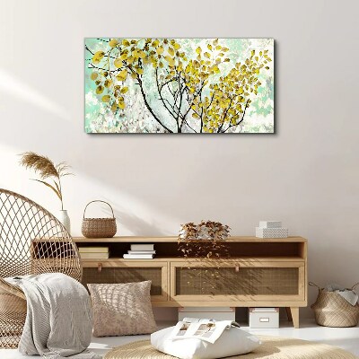 Spring leaves against the blue background Canvas wall art