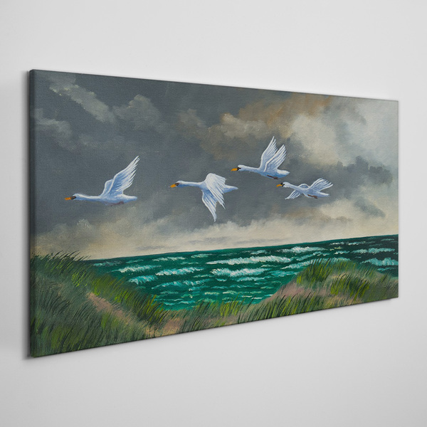 Flight of swans over the sea Canvas wall art