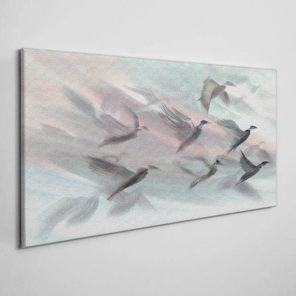 Flight of birds in a pastel aura Canvas wall art