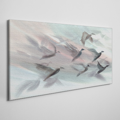 Flight of birds in a pastel aura Canvas wall art