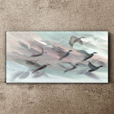 Flight of birds in a pastel aura Canvas wall art
