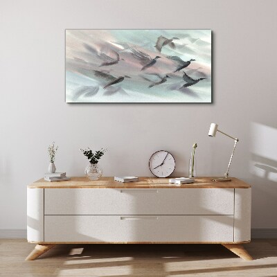 Flight of birds in a pastel aura Canvas wall art