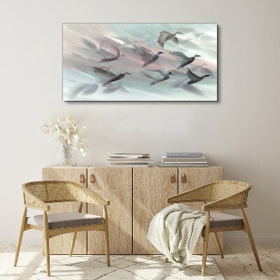 Flight of birds in a pastel aura Canvas wall art