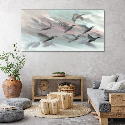 Flight of birds in a pastel aura Canvas wall art