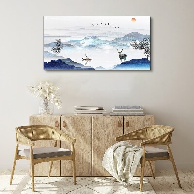 A peaceful mountain landscape with a deer Print on canvas