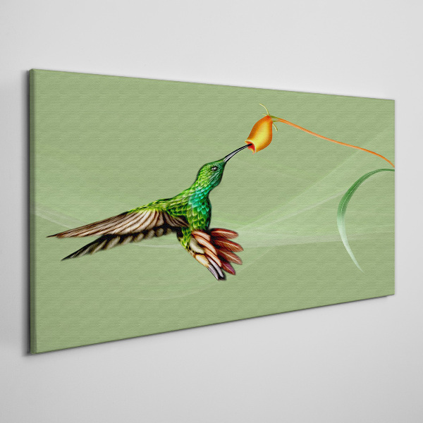 Hummingbird at a flower Print on canvas