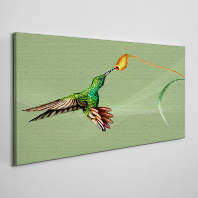 Hummingbird at a flower Print on canvas