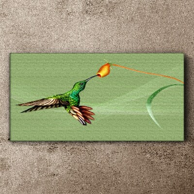 Hummingbird at a flower Print on canvas