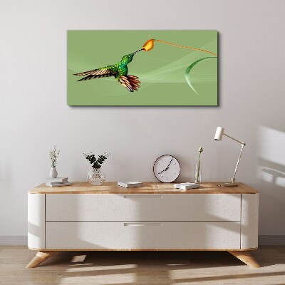 Hummingbird at a flower Print on canvas