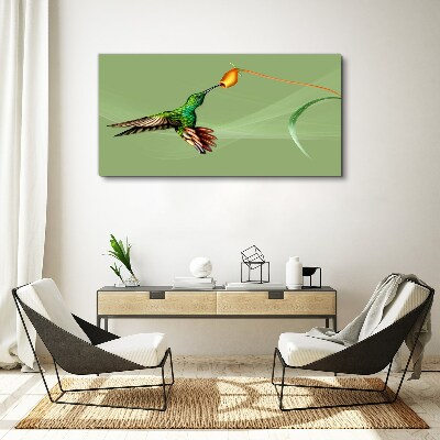 Hummingbird at a flower Print on canvas