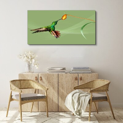 Hummingbird at a flower Print on canvas
