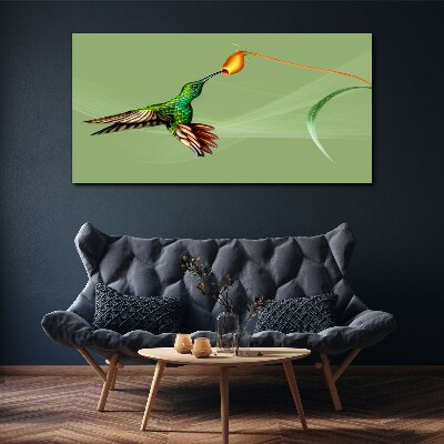 Hummingbird at a flower Print on canvas