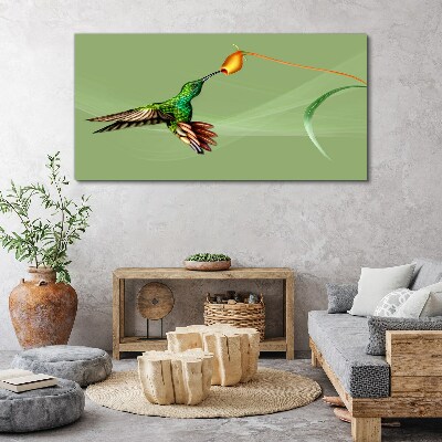 Hummingbird at a flower Print on canvas