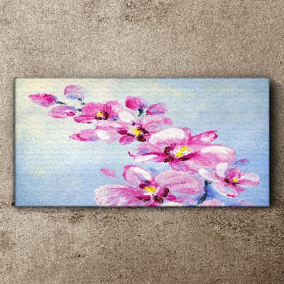 Pink orchids on a blue background Canvas wall art