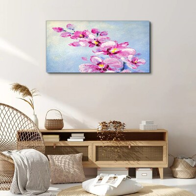 Pink orchids on a blue background Canvas wall art