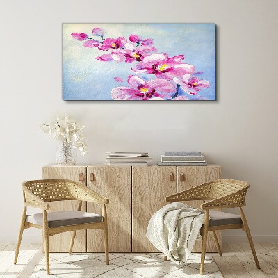 Pink orchids on a blue background Canvas wall art