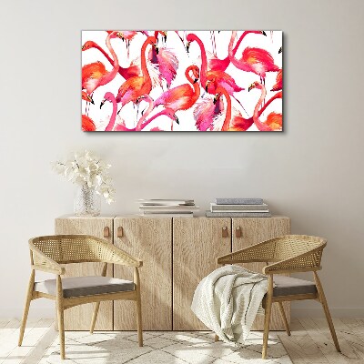 Pink flamingos in a tropical dance Canvas wall art