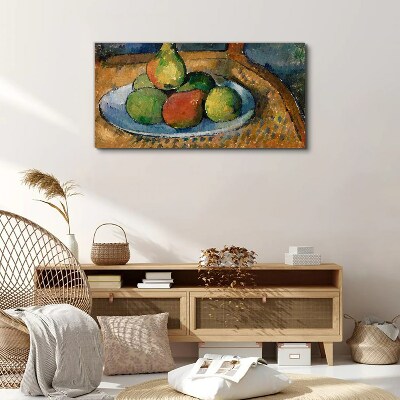 A plate of fruit on a chair Canvas print