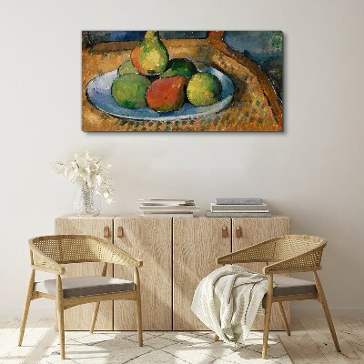 A plate of fruit on a chair Canvas print