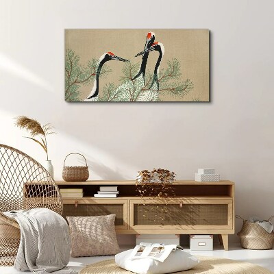 Three cranes among the pine branches Print on canvas