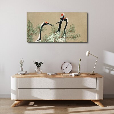 Three cranes among the pine branches Print on canvas