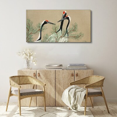 Three cranes among the pine branches Print on canvas