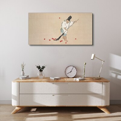 Monk cleaning with leaves Canvas wall art