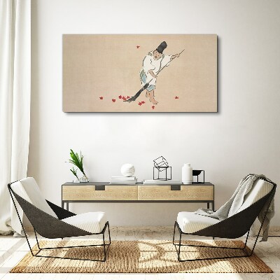 Monk cleaning with leaves Canvas wall art
