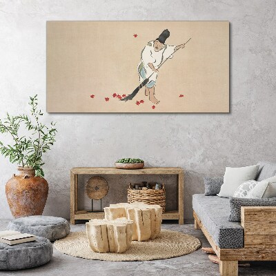 Monk cleaning with leaves Canvas wall art