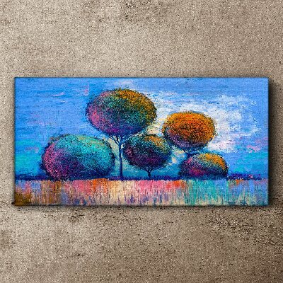 Colorful trees on a blue background Print on canvas