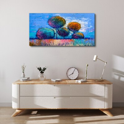 Colorful trees on a blue background Print on canvas
