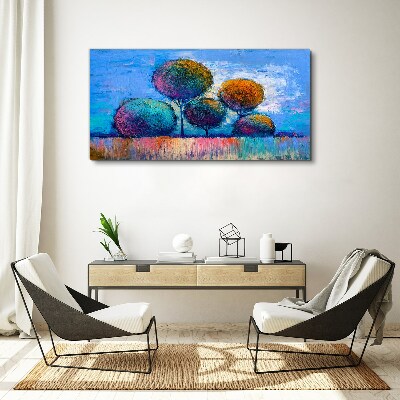 Colorful trees on a blue background Print on canvas