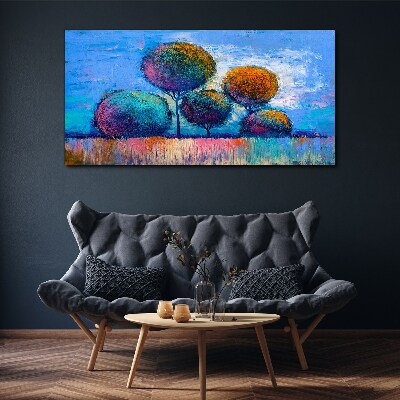 Colorful trees on a blue background Print on canvas