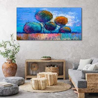 Colorful trees on a blue background Print on canvas