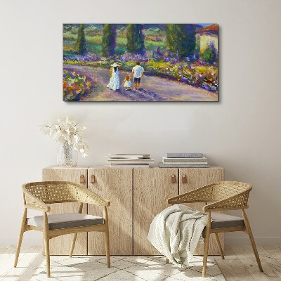 Family walk in a colorful garden Canvas wall art