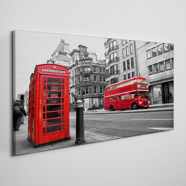 Red telephone in a grey city Canvas wall art
