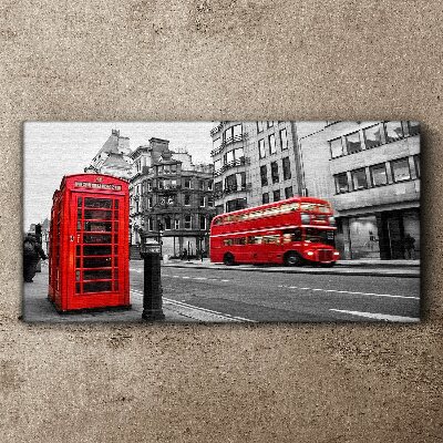 Red telephone in a grey city Canvas wall art